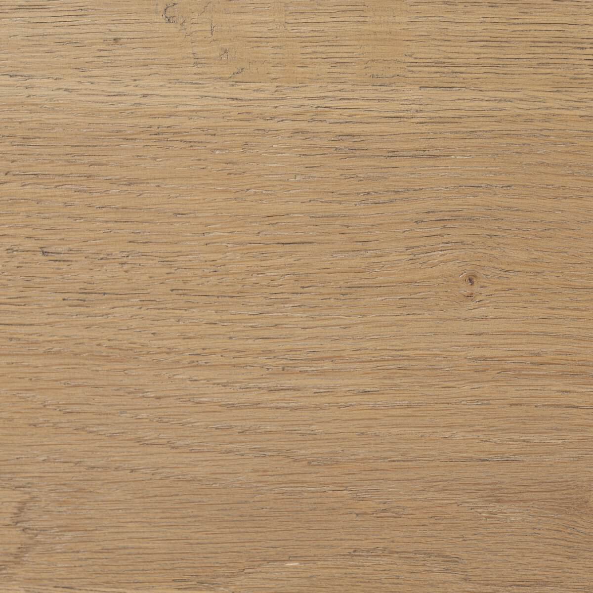 Close up of Four Hands Tula Writing Desk in Worn Oak Veneer on a white background at Addison West