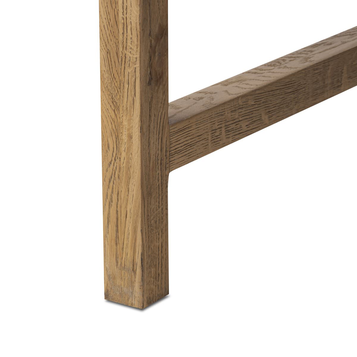 Close up of Four Hands Tula Writing Desk in Worn Oak Veneer on a white background at Addison West