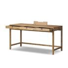 Four Hands Tula Writing Desk in Worn Oak Veneer on a white background at Addison West