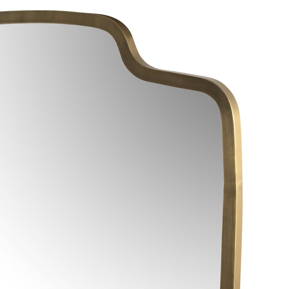 Close up Four Hands Vault Mirror in Antique Brass on a white background at Addison West