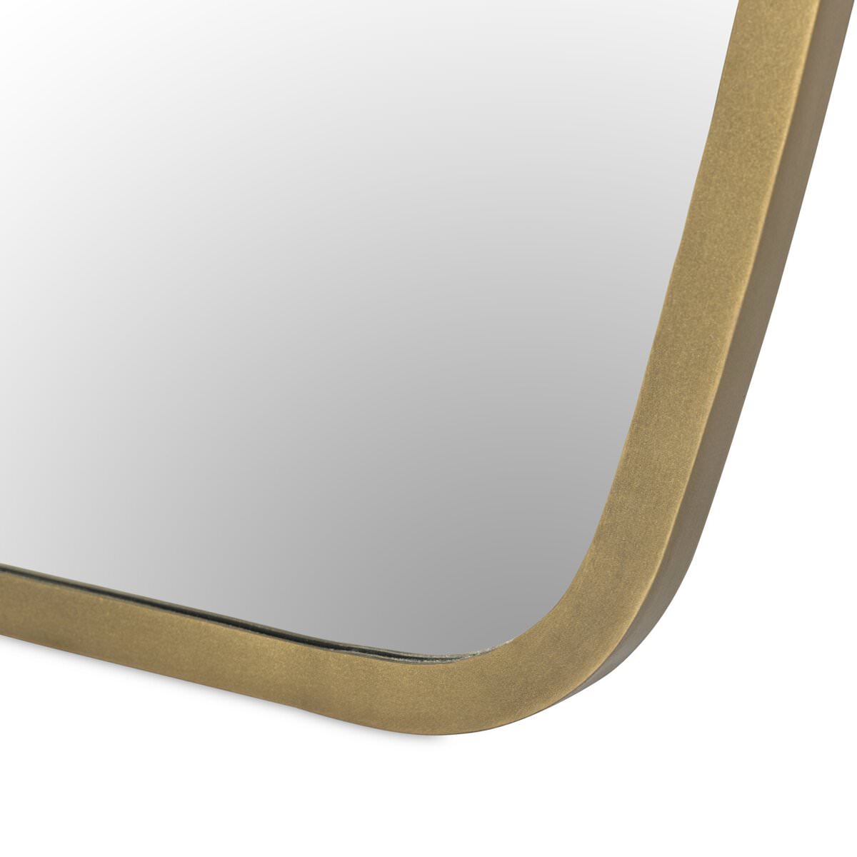 Close up Four Hands Vault Mirror in Antique Brass on a white background at Addison West