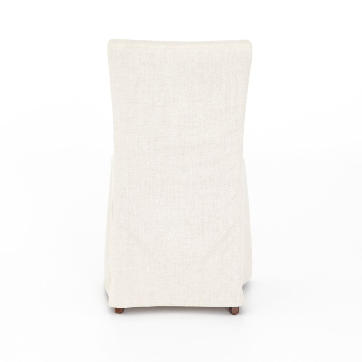 Back of Four Hands Vista Slipcovered Dining Chair in Savile Flax on a white background