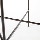 Close up of Four Hands Wharton Bar Stool in Distressed Brown on a white background at Addison West