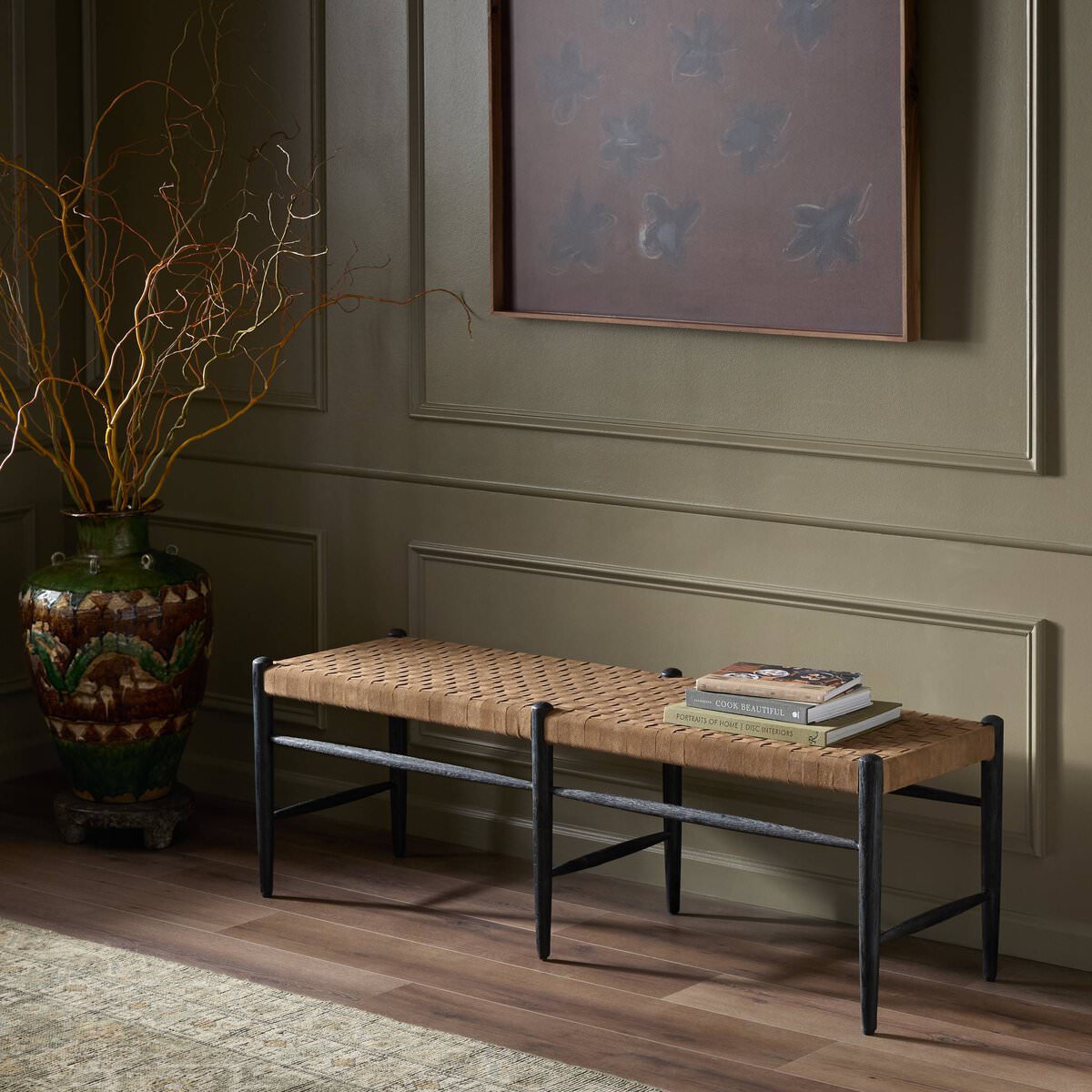 Four Hands Wyatt Bench in Coffee Suede in a green hallway at Addison West