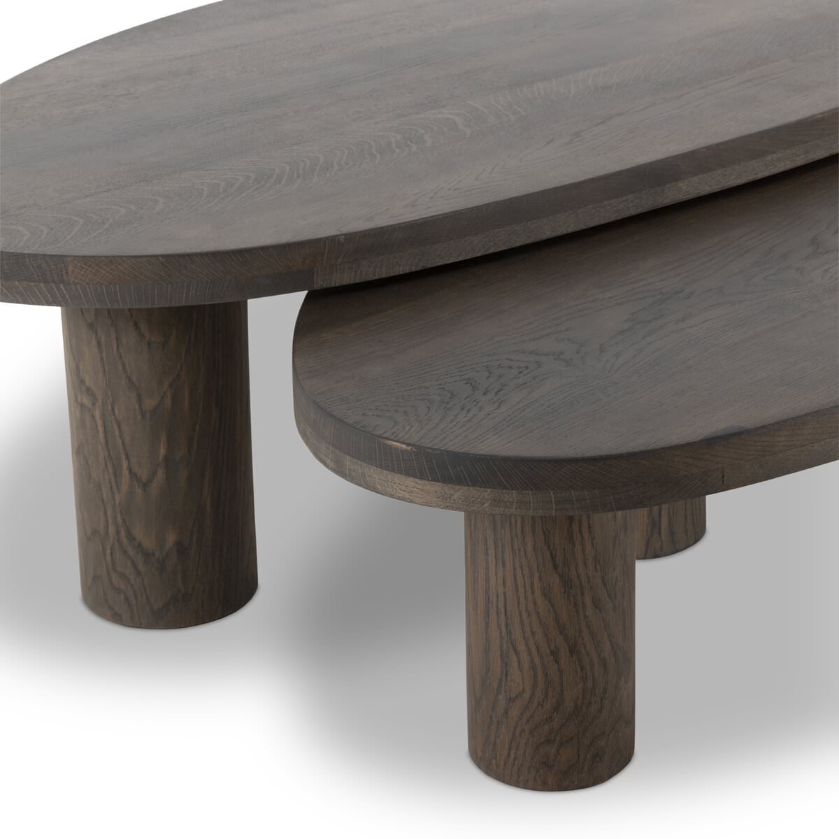Close up of Four Hands Zion Nesting Coffee Table Set in Grey Tobacco Oak on a white background at Addison West