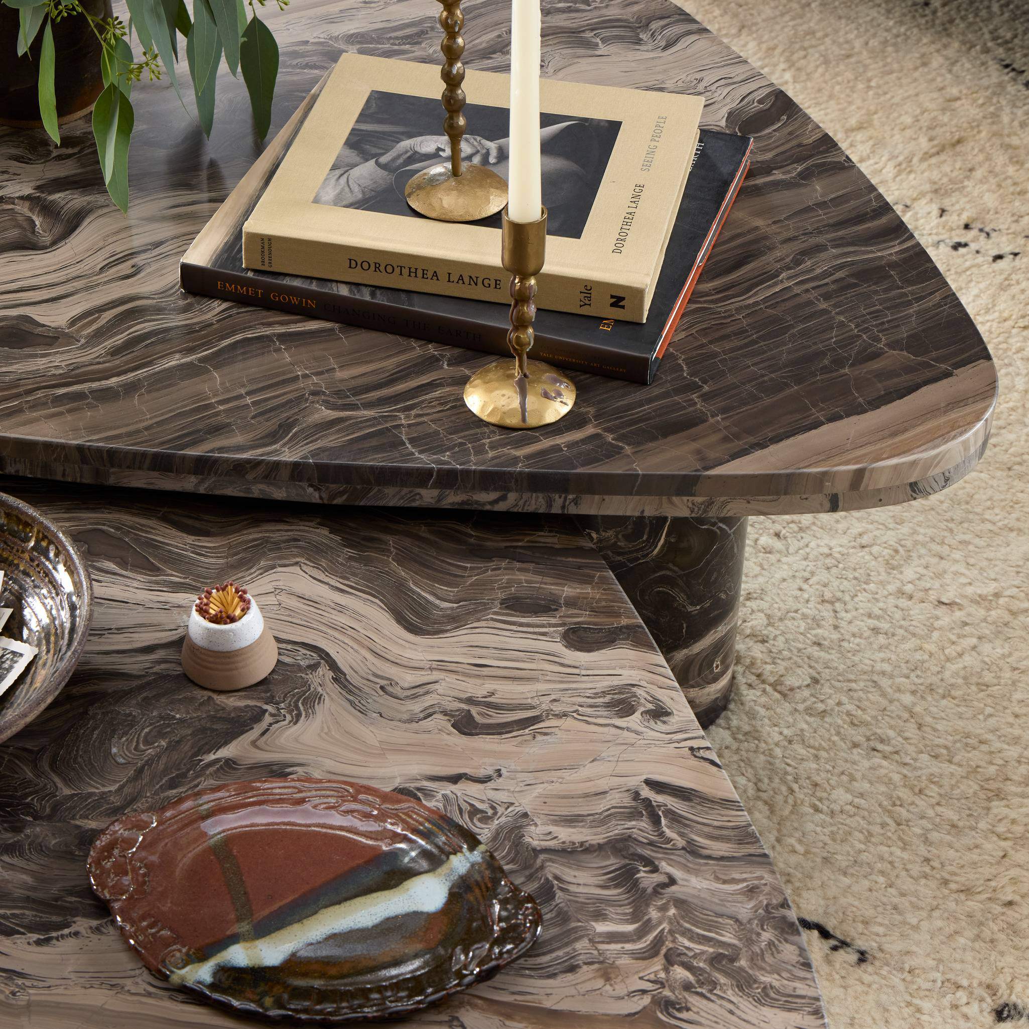 Four Hands Zion Nesting Coffee Tables in Rocky Brown Marble in living room at Addison West.