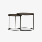 Four Hands Lavastone Nesting Tables in Black Lavastone round nesting tables on a white background