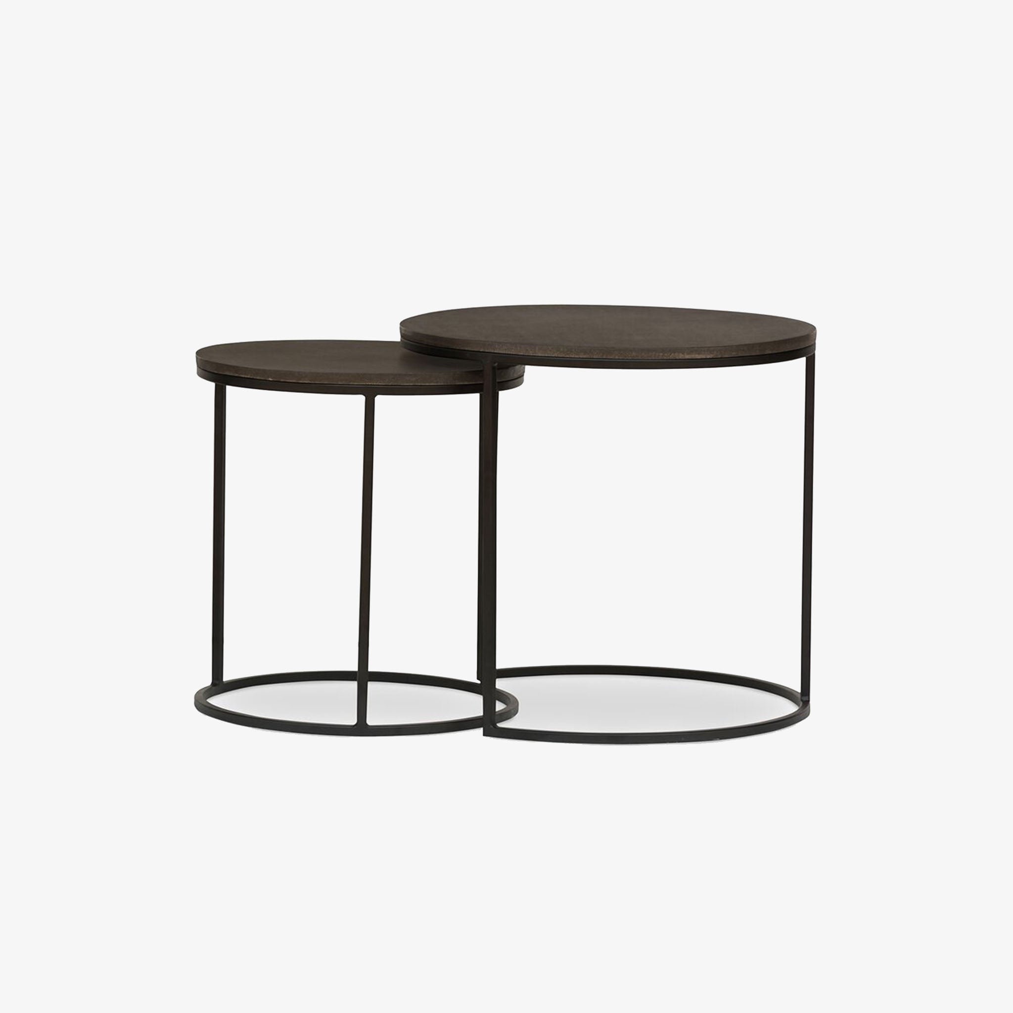 Four Hands Lavastone Nesting Tables in Black Lavastone round nesting tables on a white background
