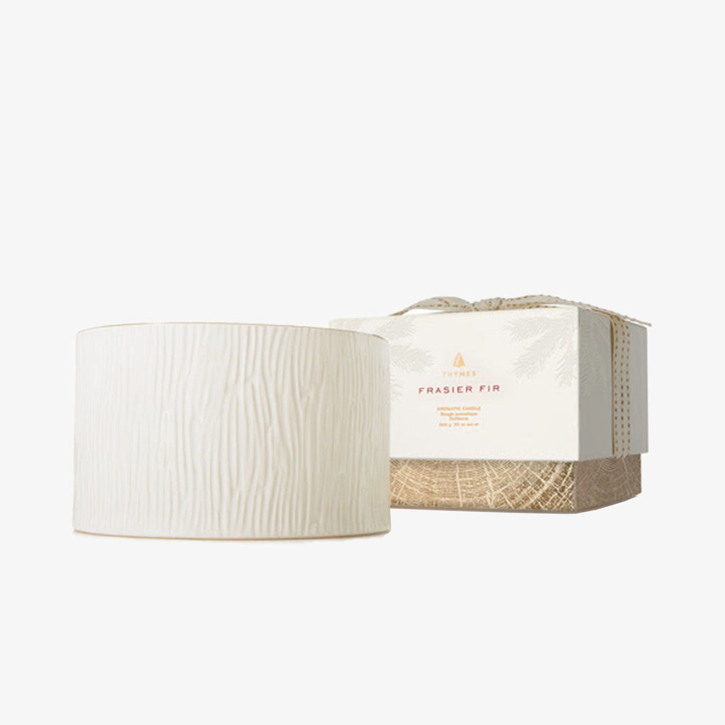 Thymes Frasier Fir Gilded Ceramic three wick Candle on a white background