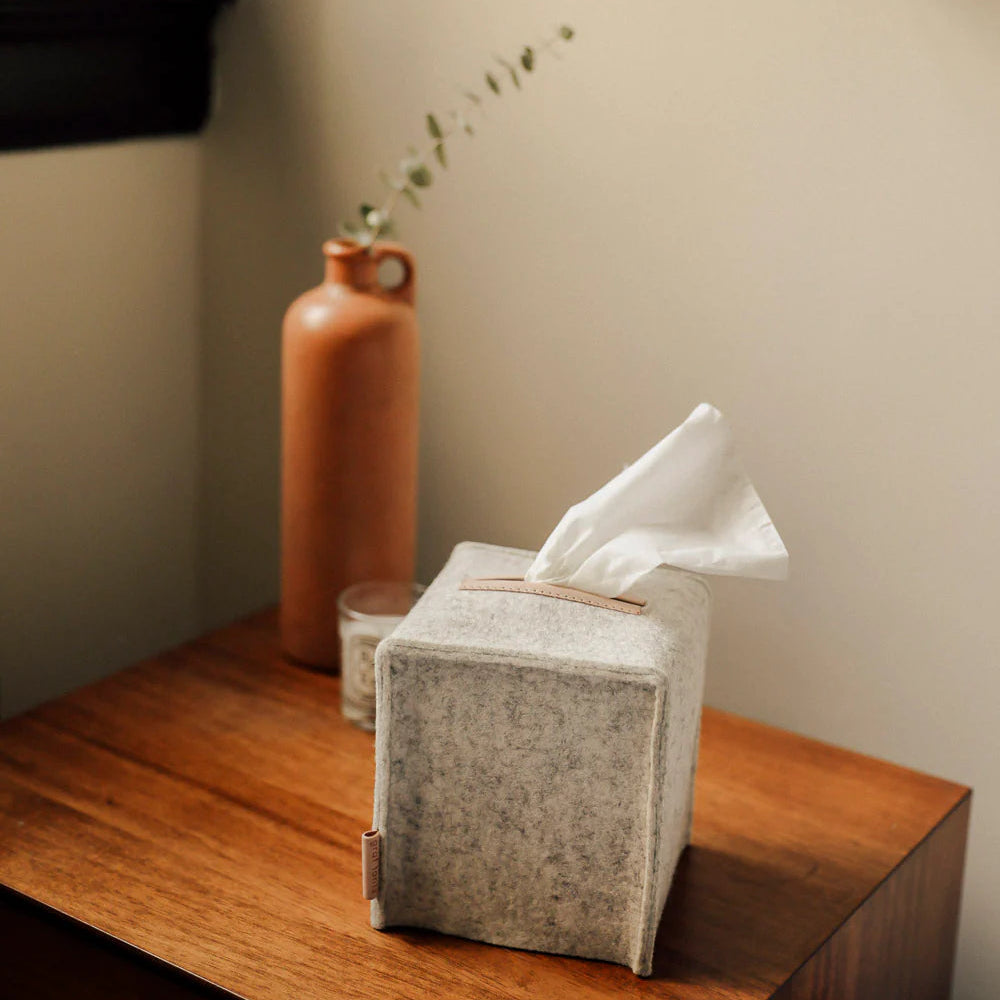 Graf Lantz Merino Wool Tissue Box Cover in Heather White on a table at Addison West