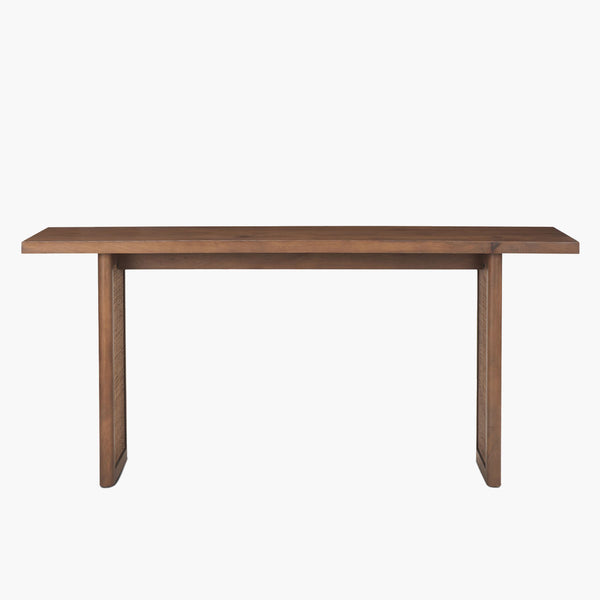 Wood console table in medium stain with cane panels on each leg on a white background