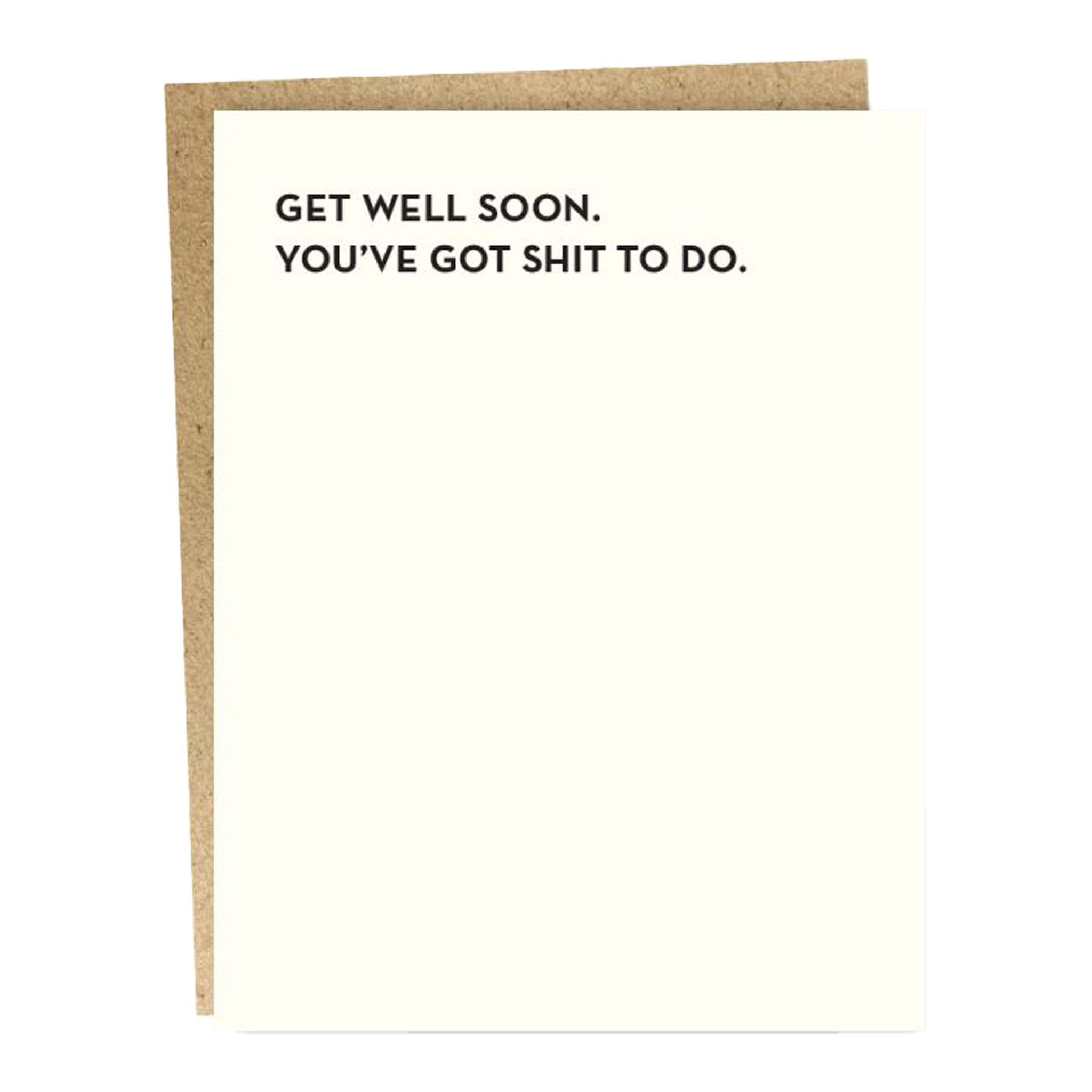 A greeting card with a simple design, white background, black text that reads 'GET WELL SOON. YOU'VE GOT SHIT TO DO.
