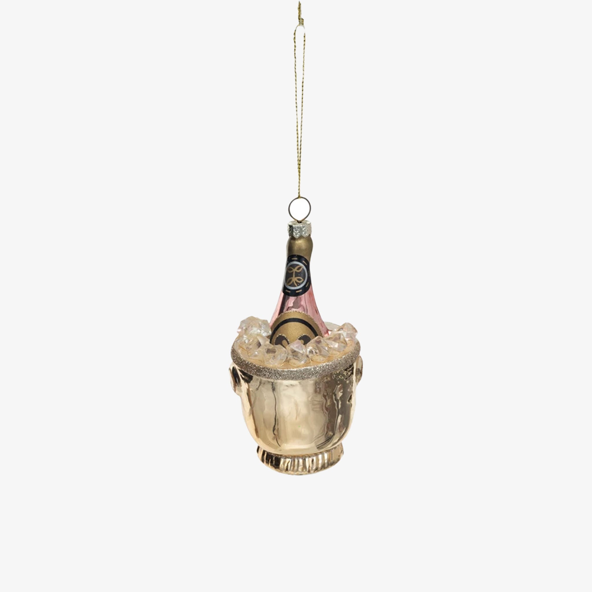 A glass ice bucket with a champagne bottle inside, designed as a holiday ornament, intended to be hung