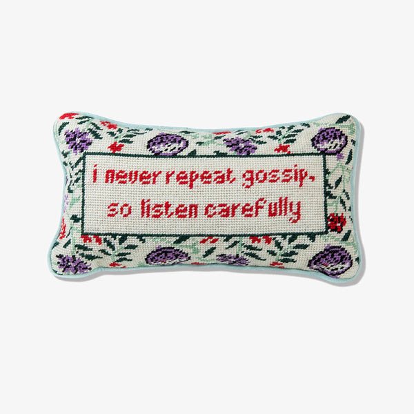 Furbish needlepoint pillow with saying 'I never repeat gossip, so listen carefully' on a white background