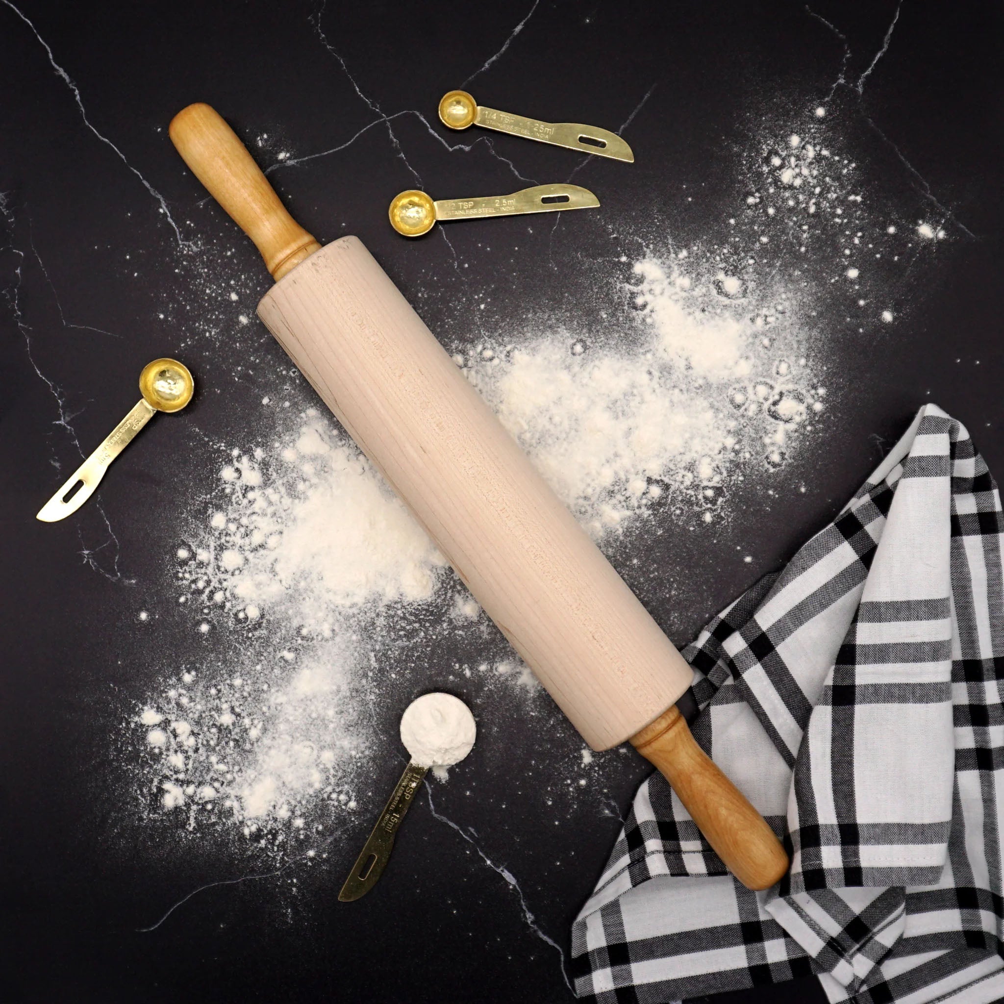 JK Adams Gourmet Rolling Pin on a black kitchen counter at Addison wEST