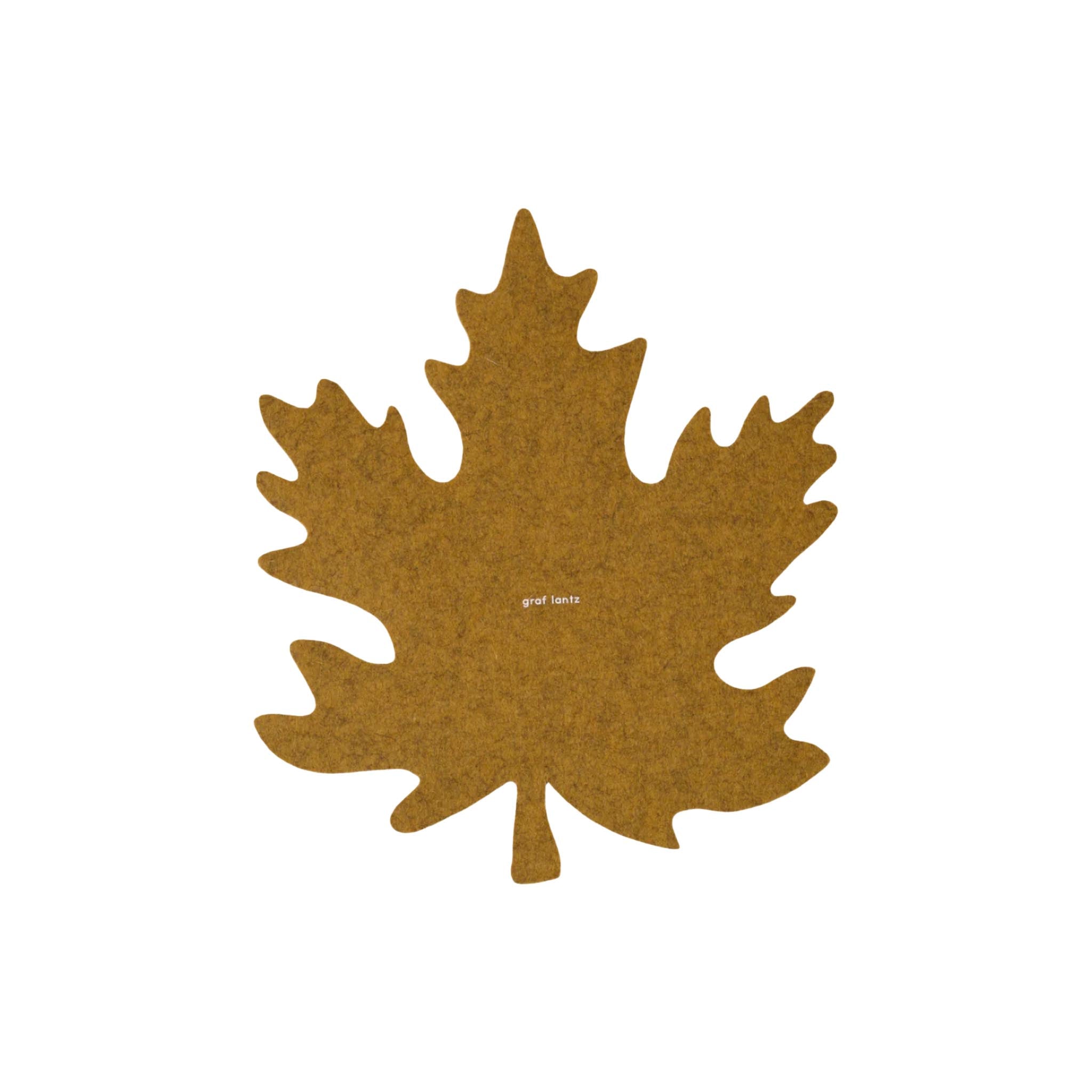 Brown leaf-shaped felt trivet by graf lantz on a white background