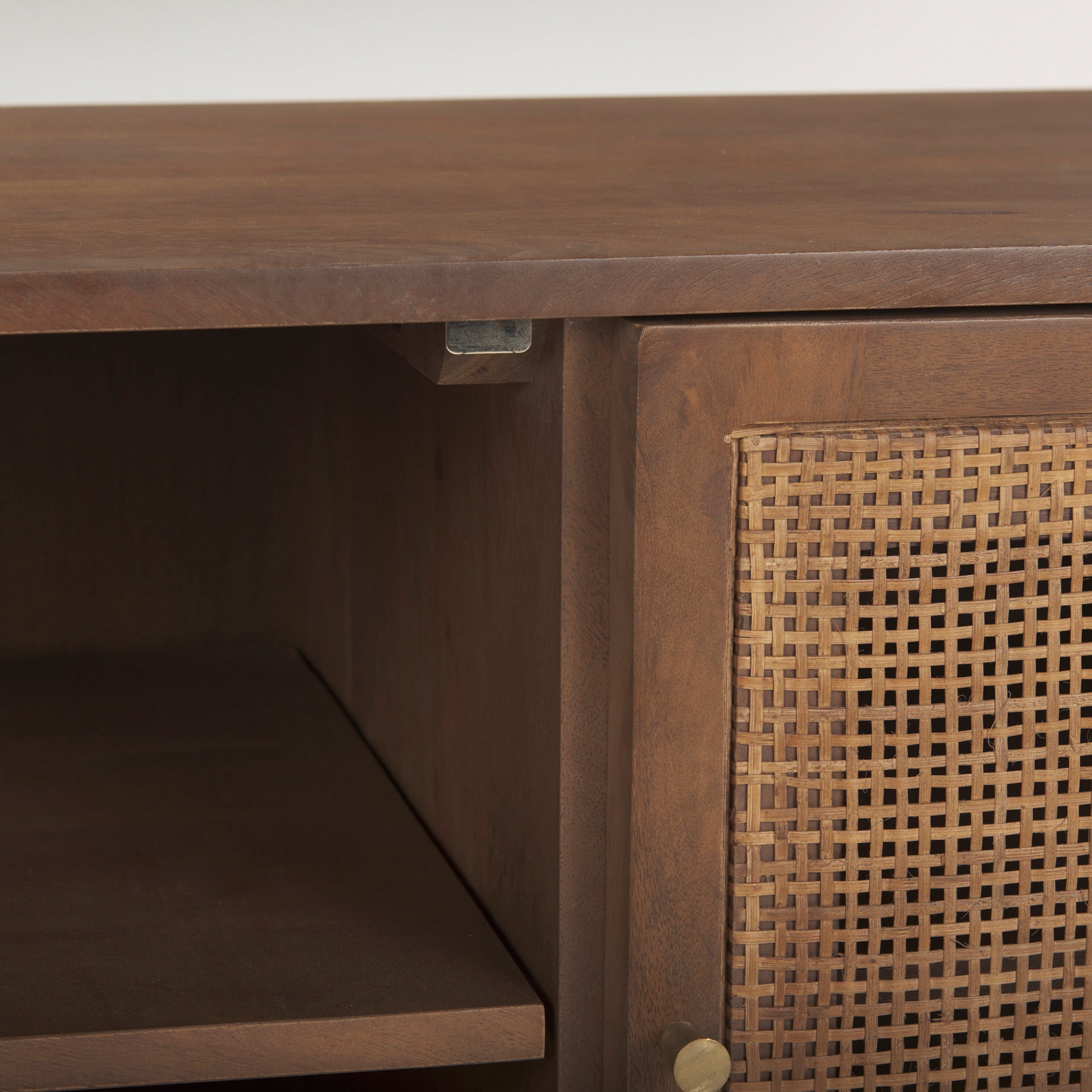 Grier Medium Brown Solid Wood with Cane Media Console on a white background