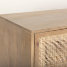 Close up of Grier Light Brown Solid Wood with Cane Sideboard on a white background
