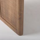 Mango wood Dining Table with two support legs in Dark Wash with Cane insets on base on a white background