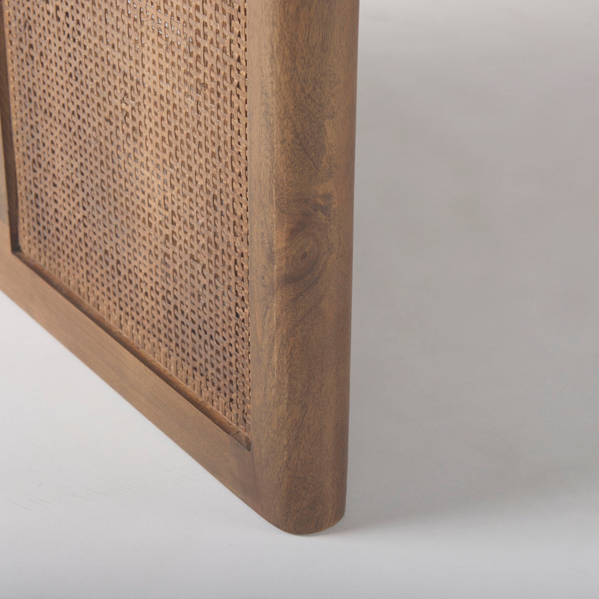 Mango wood Dining Table with two support legs in Dark Wash with Cane insets on base on a white background