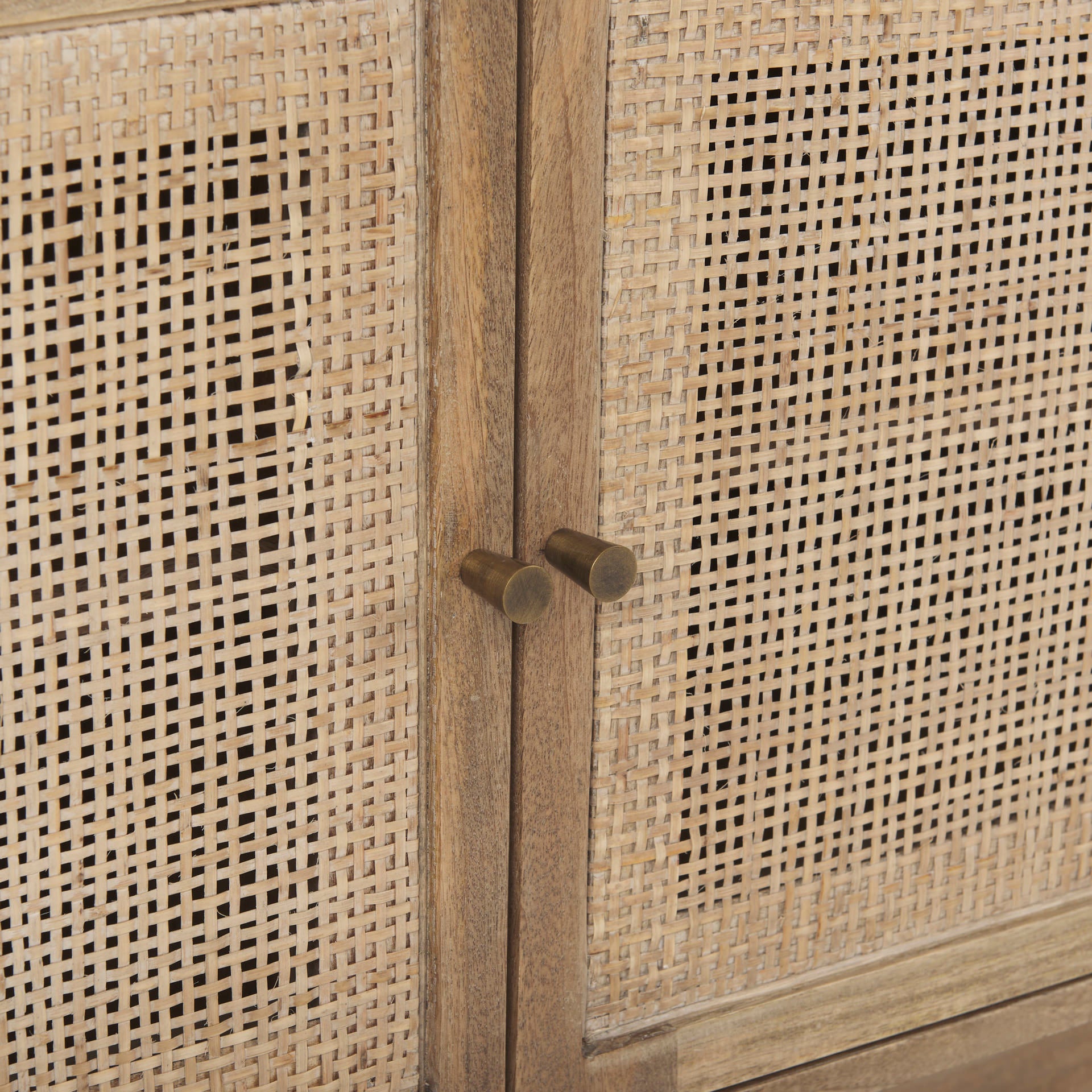 Close up of Grier Light Brown Solid Wood and Cane 3 Door Media Console