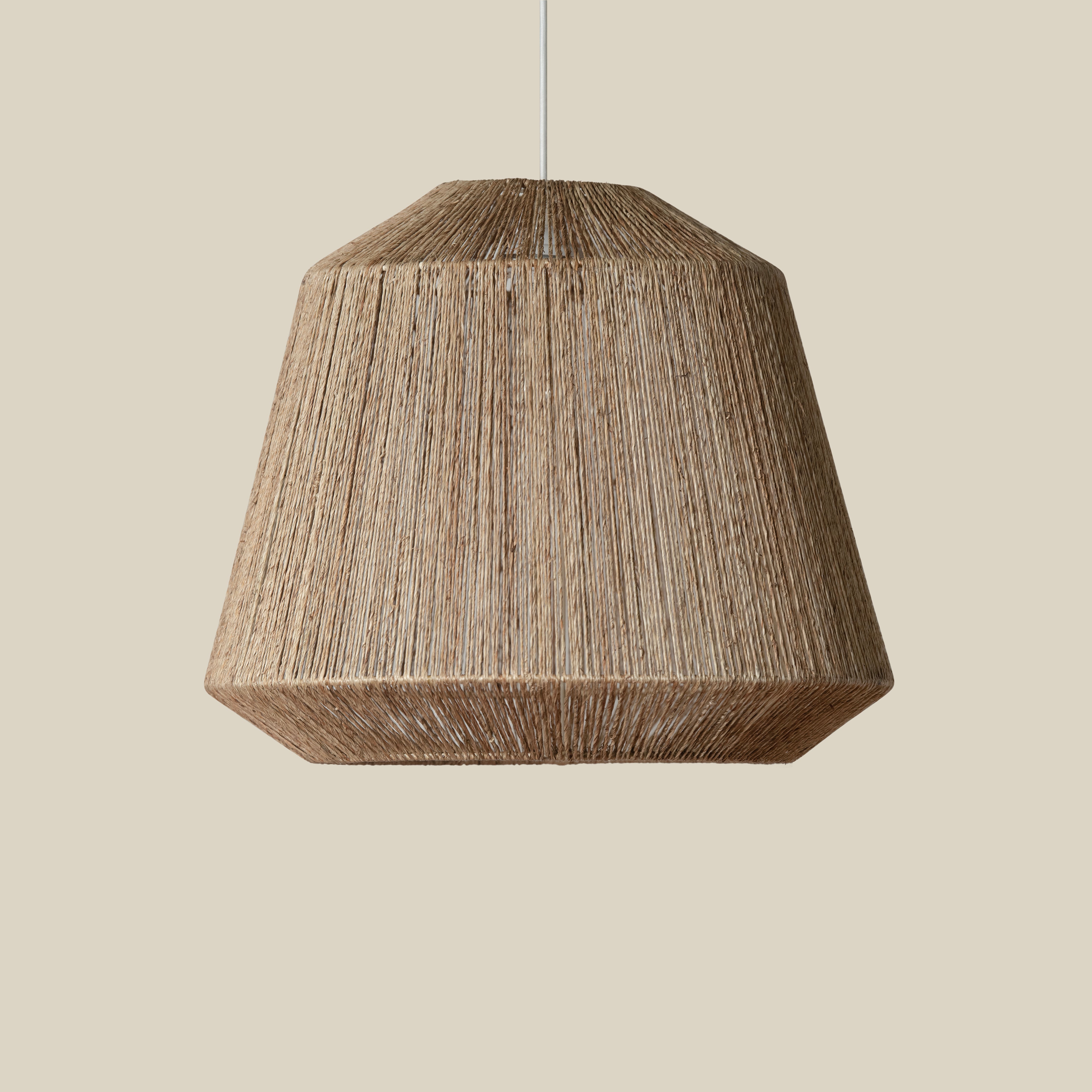 Manhattan Jute Pendant in Natural on a beige background at Addison West