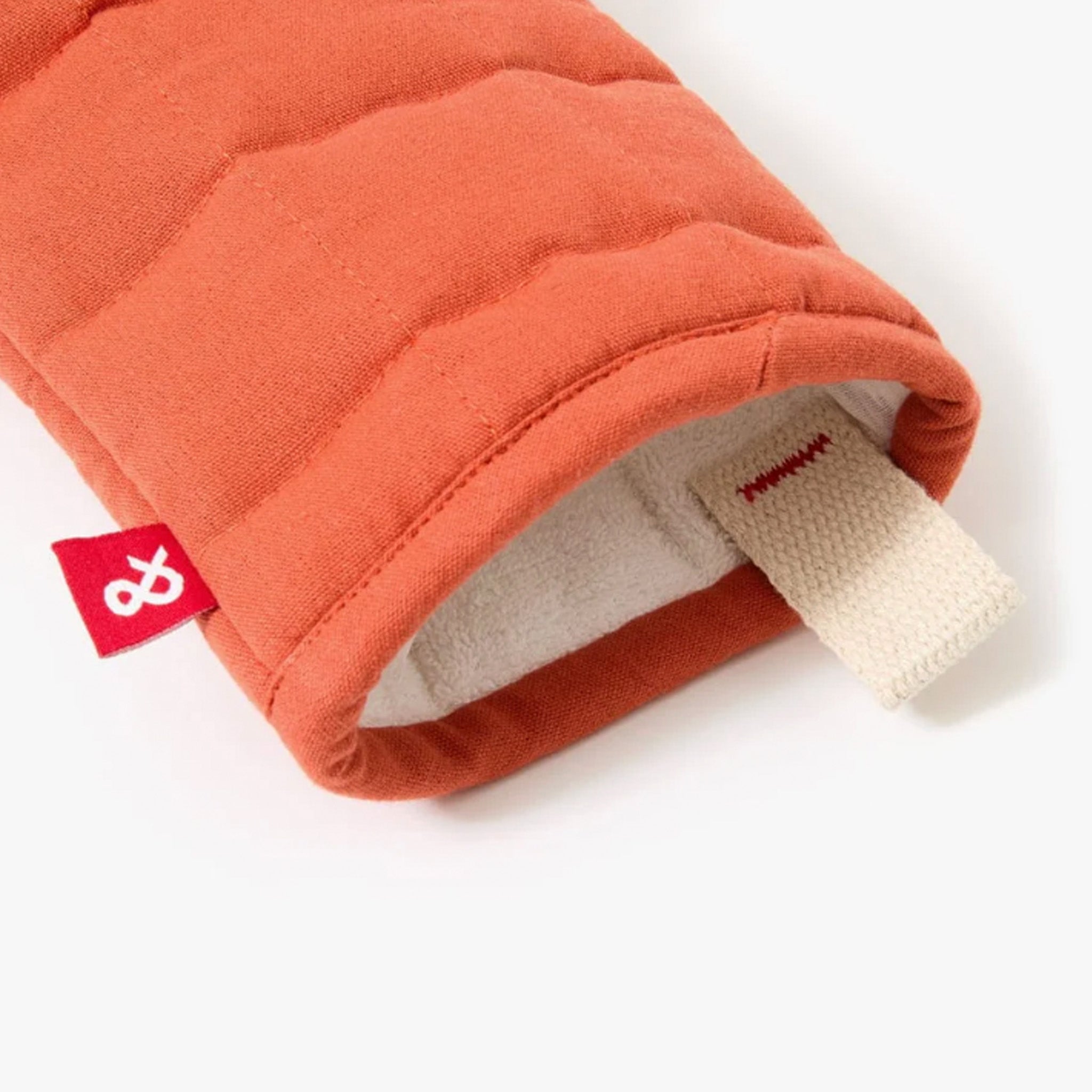 Hedley & Bennett Paprika Oven Mitts on plain background at Addison West.