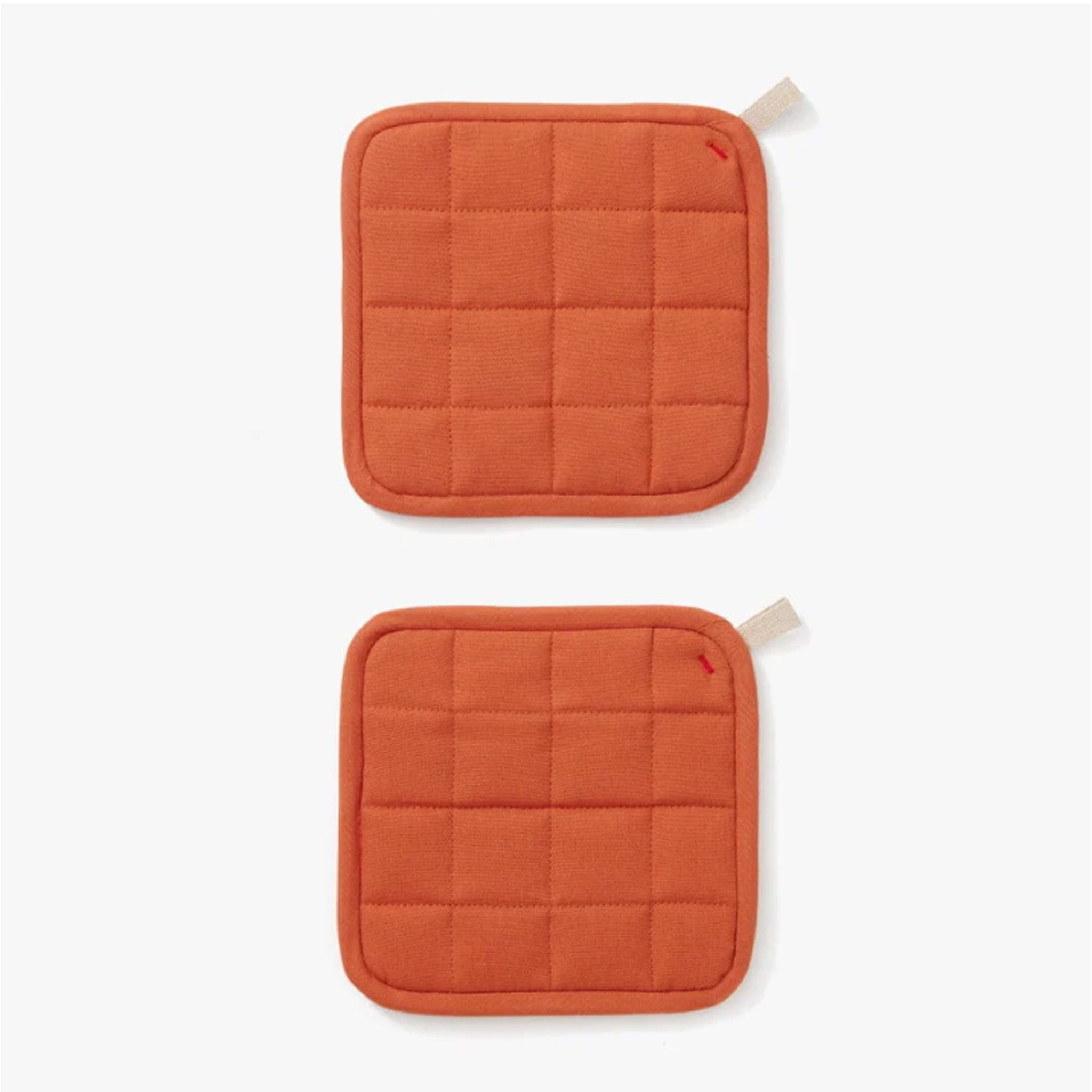 Hedley & Bennett Paprika Pot Holders on plain background at Addison West.