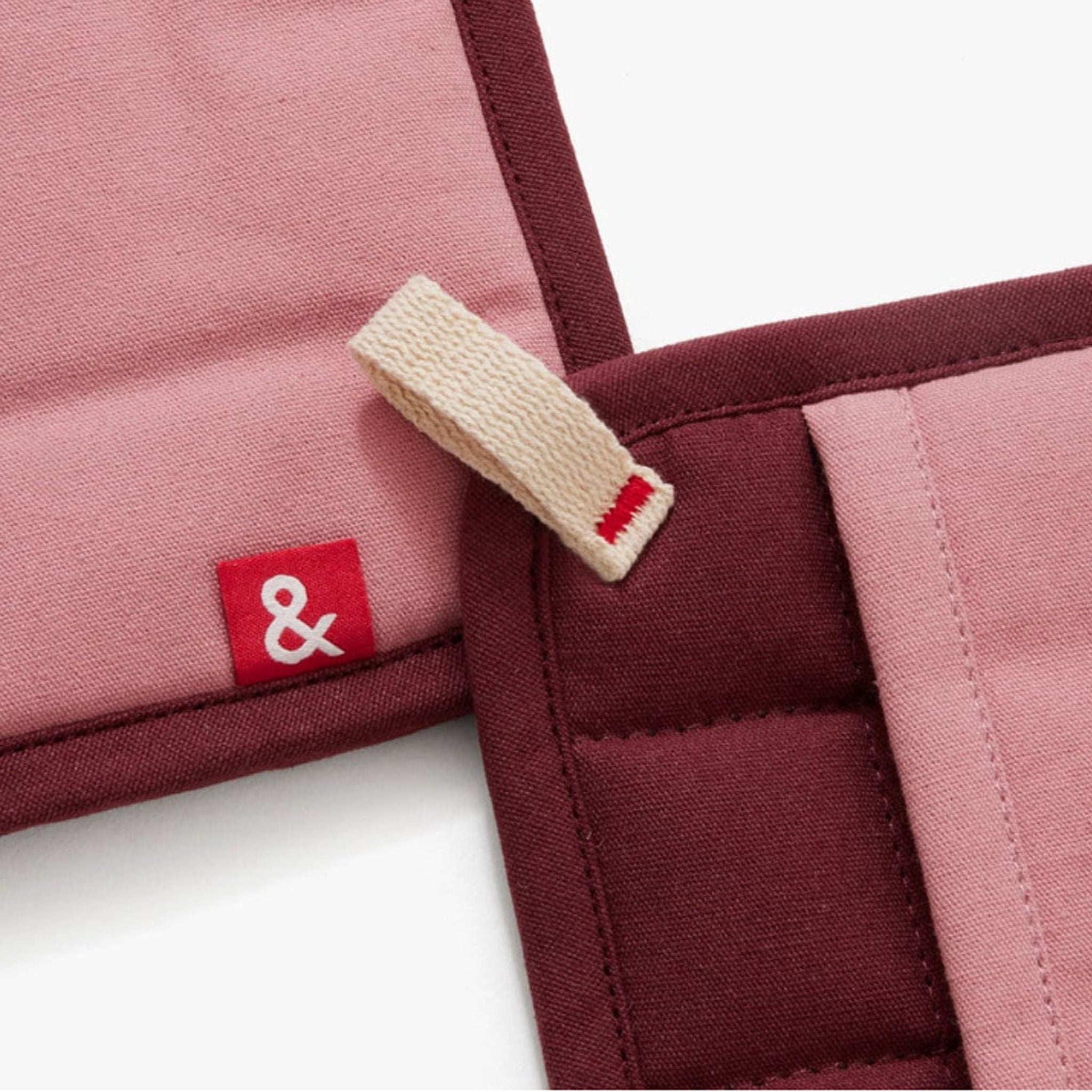 Hedley & Bennett Rhubarb Pot Holders on plain background at Addison West.