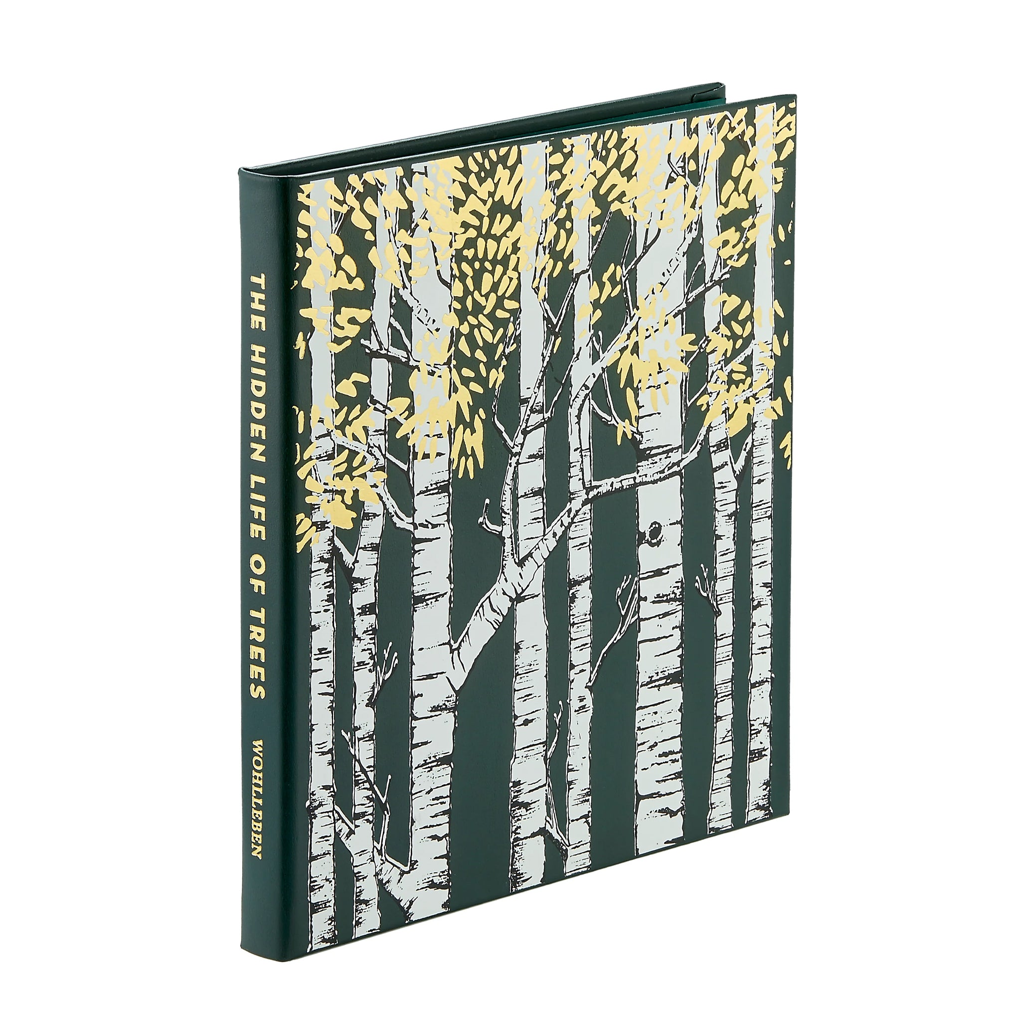 Book 'The Hidden Life of Trees' leather bound edition with tree design on cover on a white background