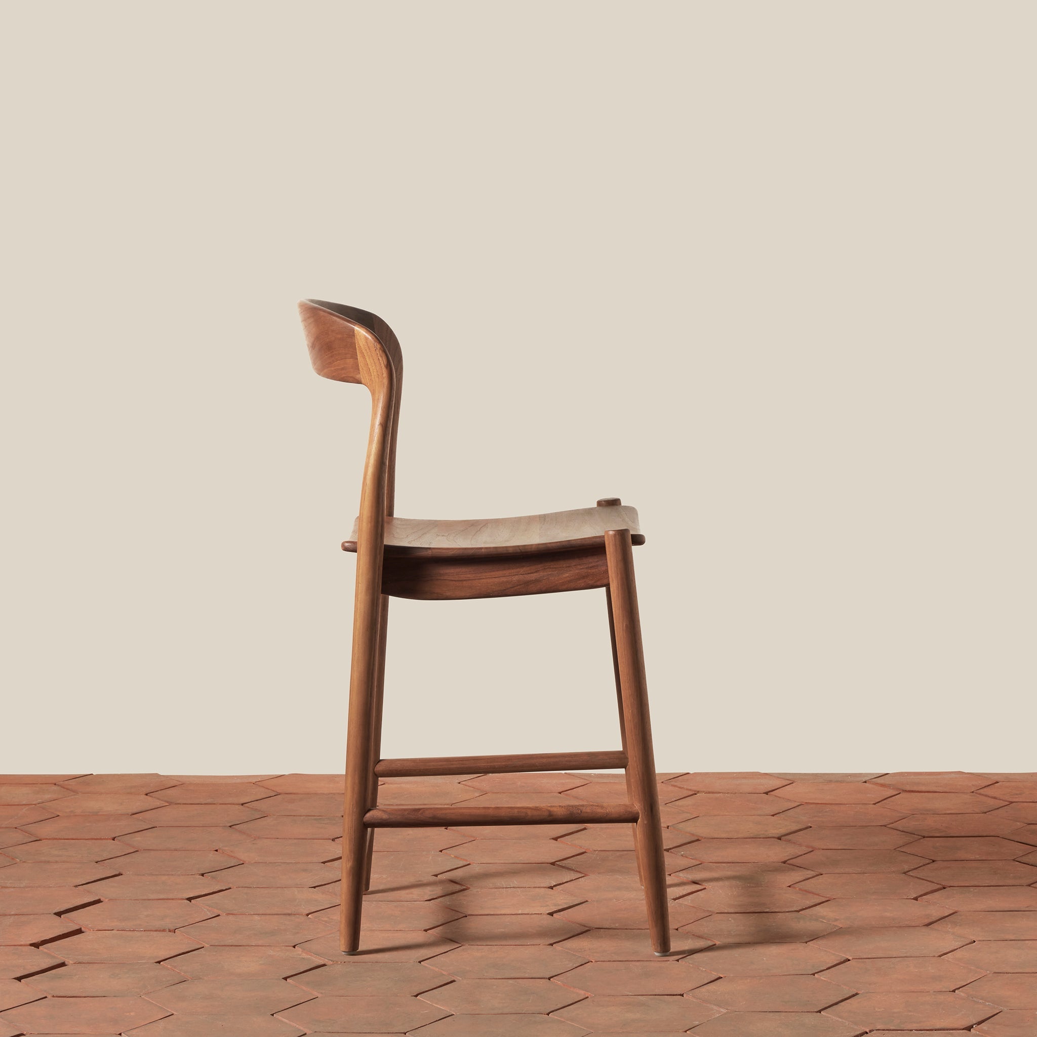 Ingrid Counter Stool on a beige background at Addison West