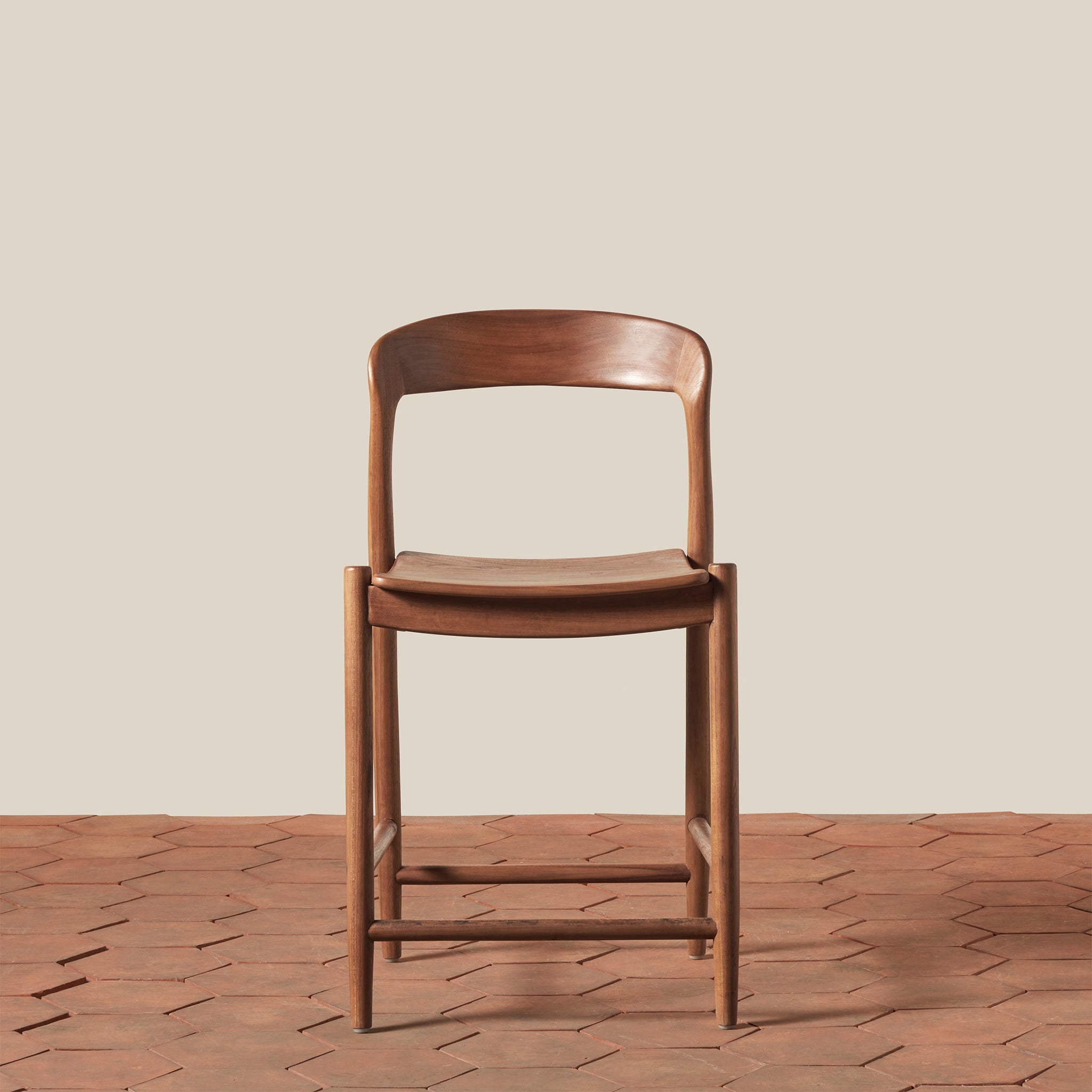 Ingrid Counter Stool on a beige background at Addison West