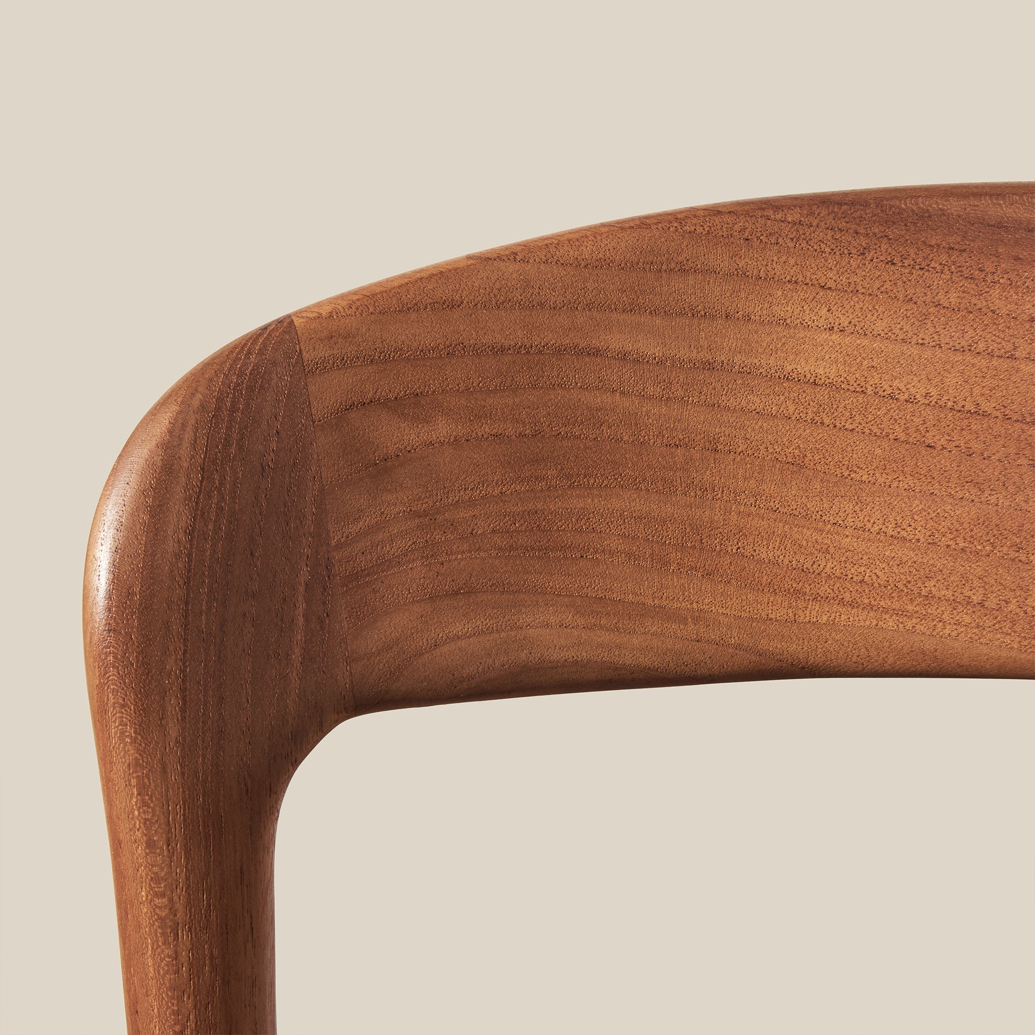 Close up of Ingrid Counter Stool on a beige background at Addison West