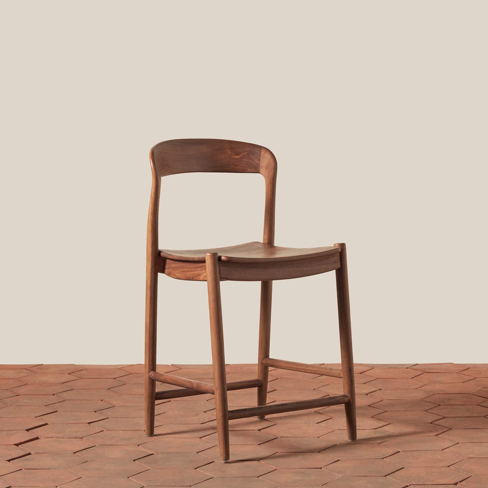 Ingrid Counter Stool on a beige background at Addison West