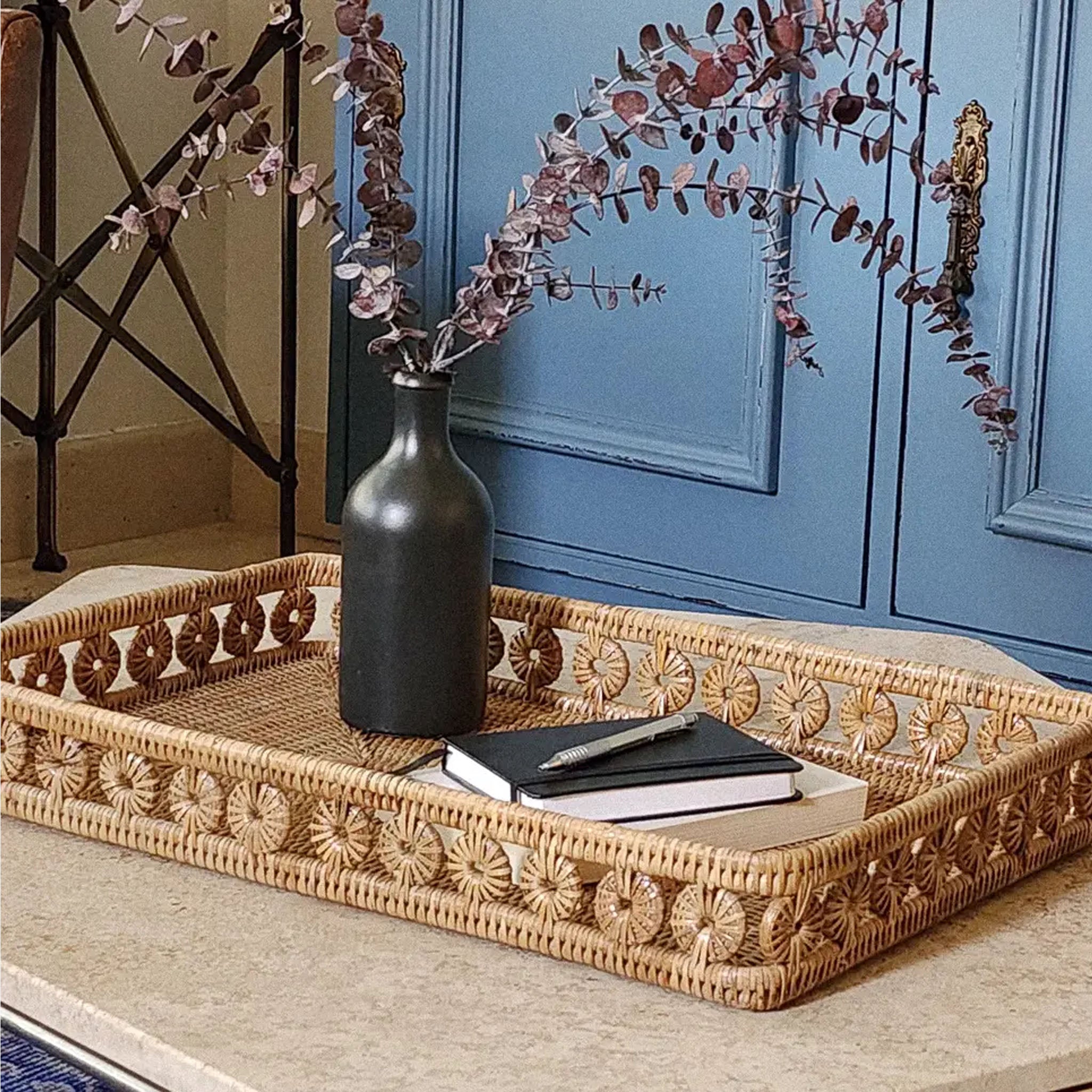 Ingrid Rattan Rectangular Tray on a white background at Addison West on a table at Addison West
