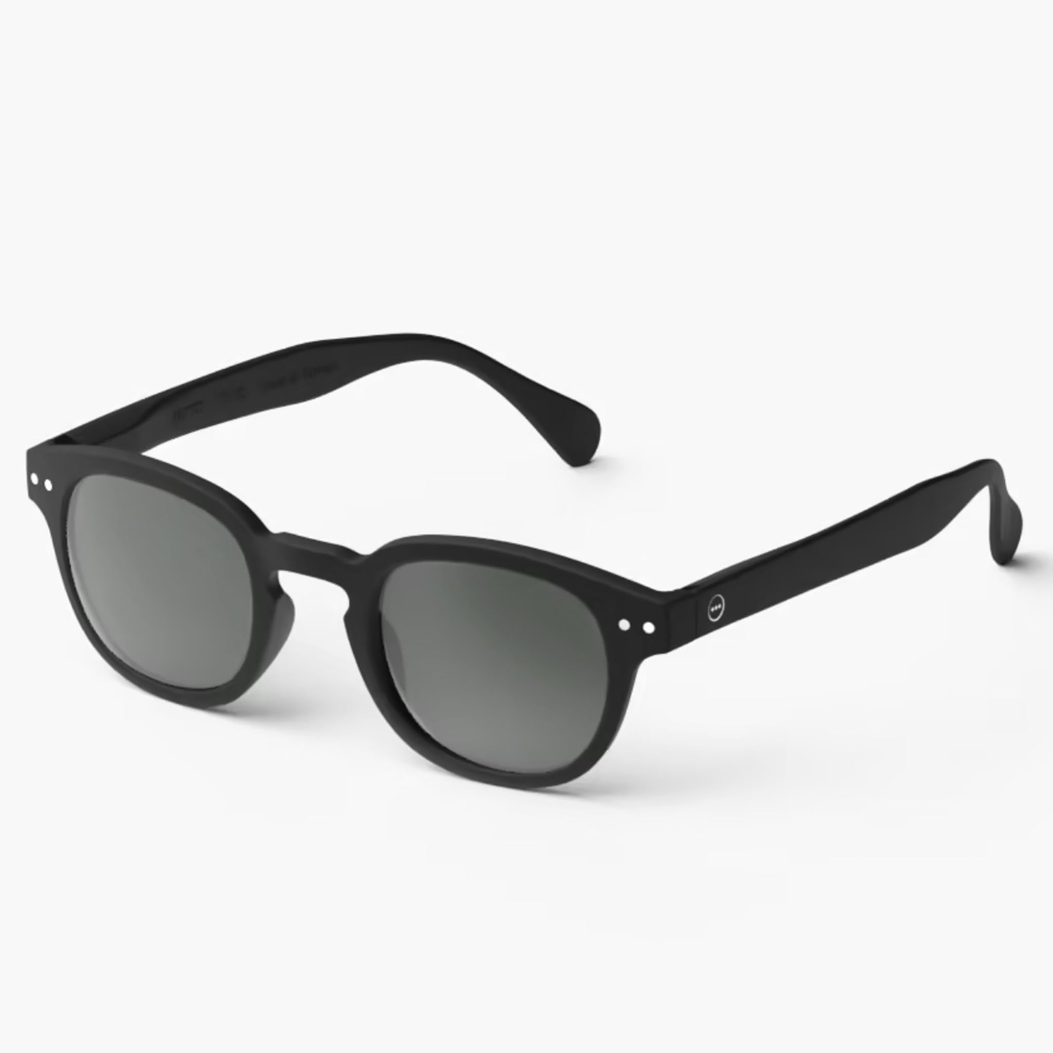 Izipizi #C Black Sunglasses on a white background at Addison West