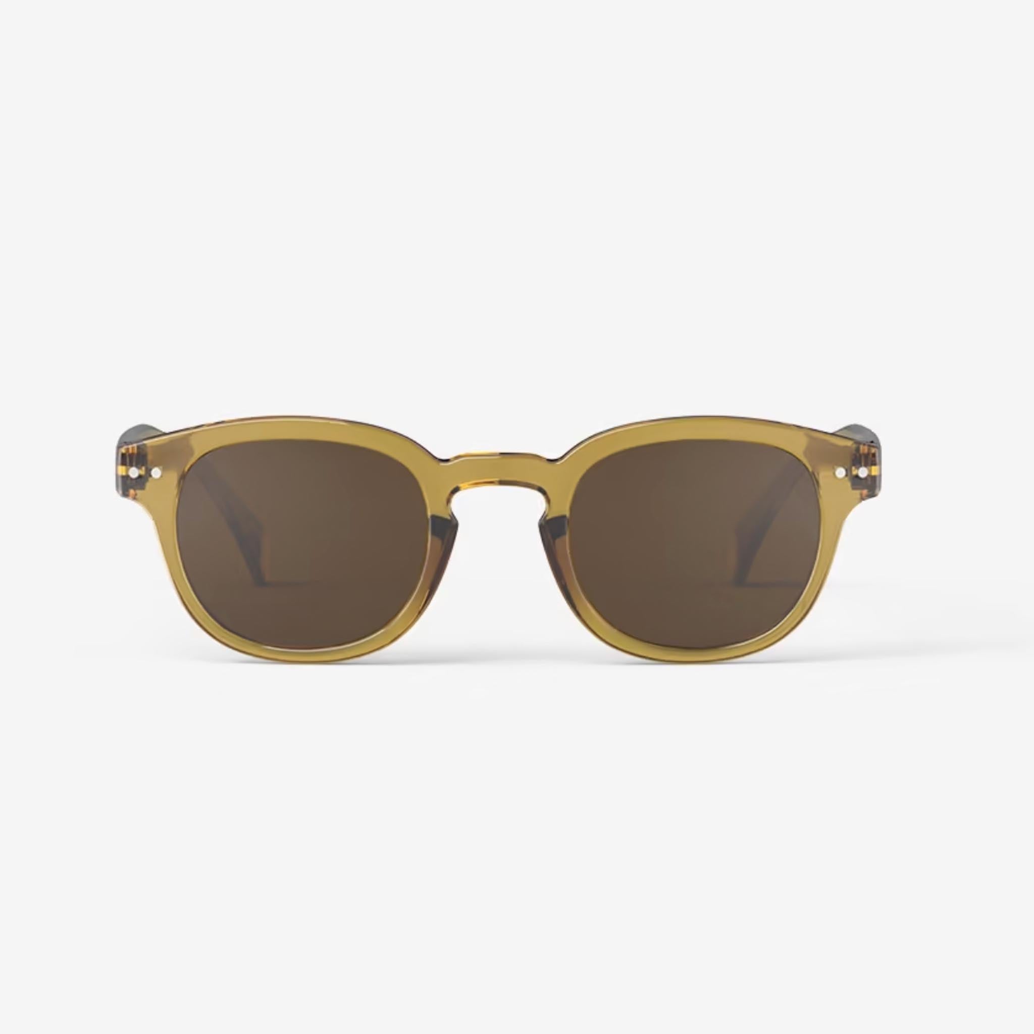 Izipizi #C Golden Green Sunglasses on a white background at Addison West