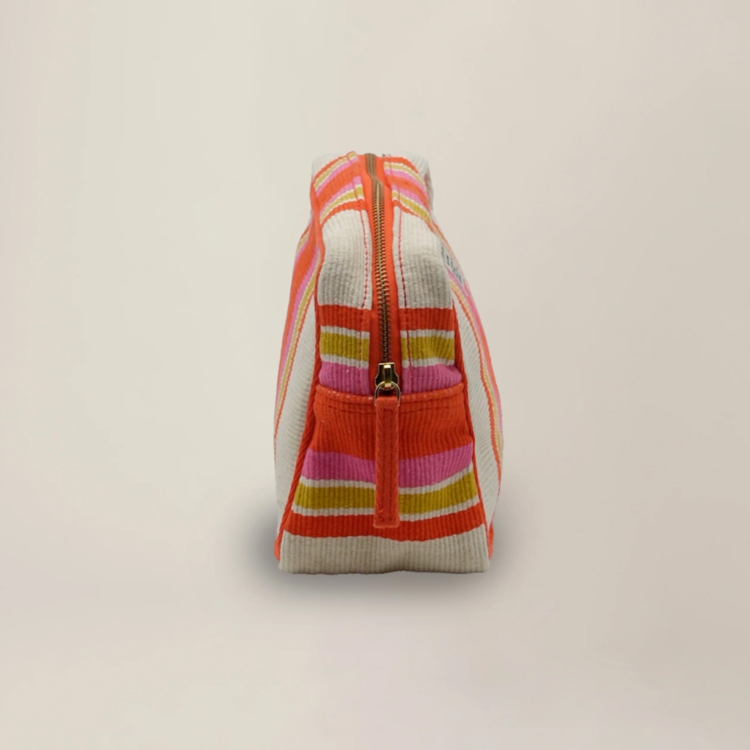 Large Pouch N°43 in Bari Spritz on a beige background at Addison West