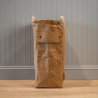 Uashmama Laundry Hamper Bag in Avana on a grey background at Addison West