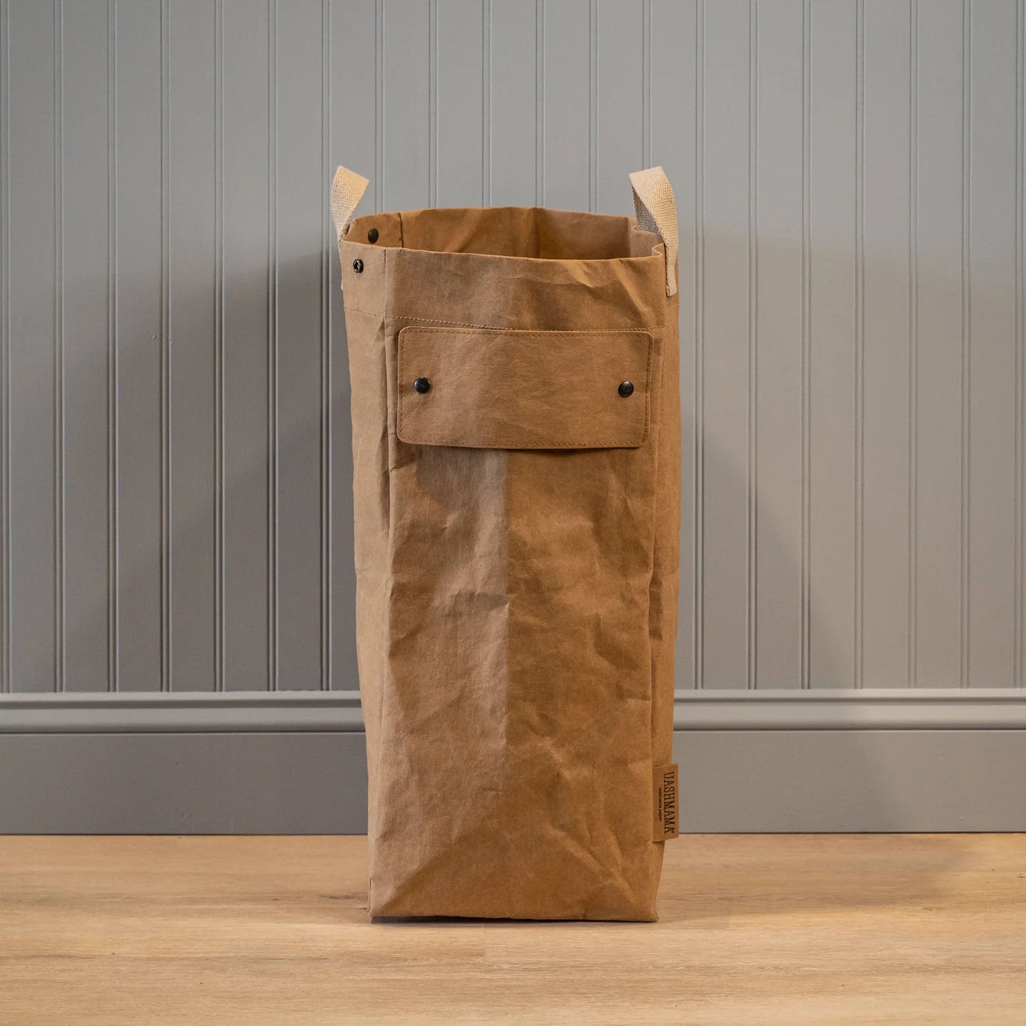 Uashmama Laundry Hamper Bag in Avana on a grey background at Addison West