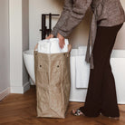 Uashmama Laundry Hamper Bag in a laundry room at Addison West