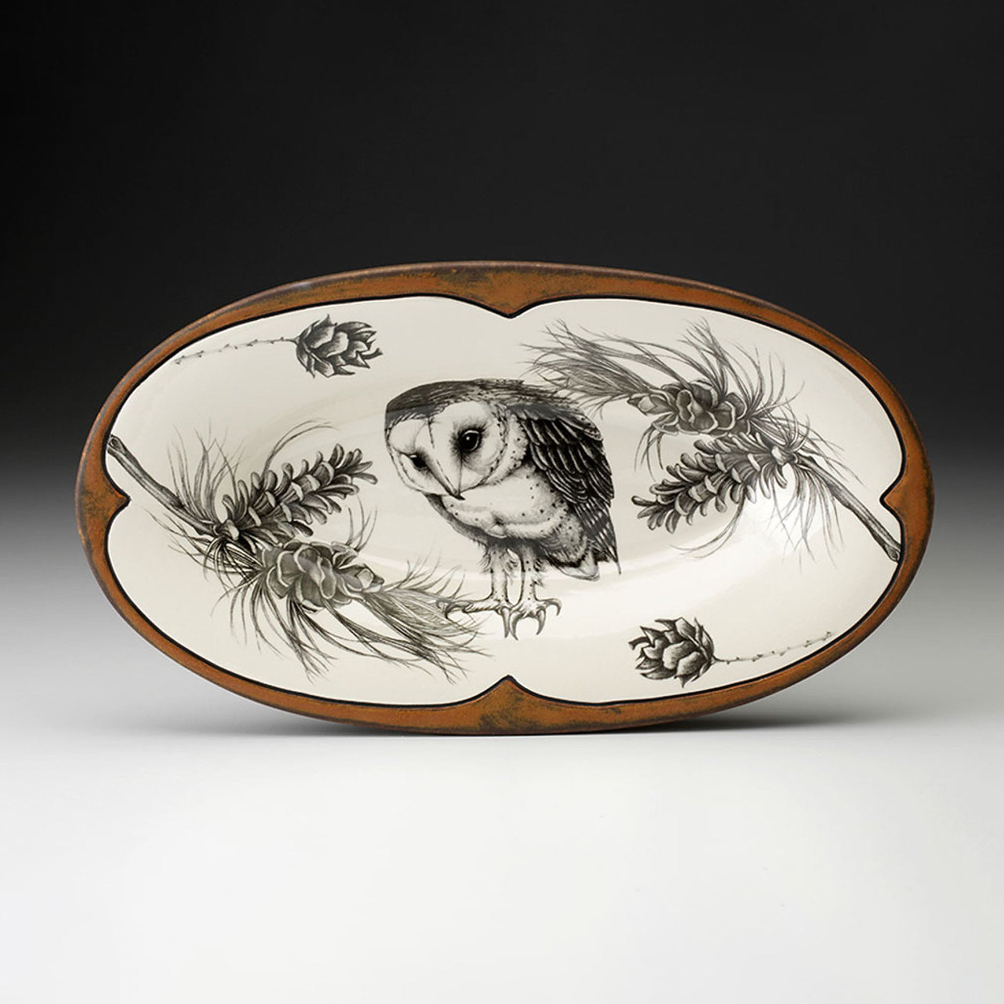 Decorative plate with a bird design on a white background