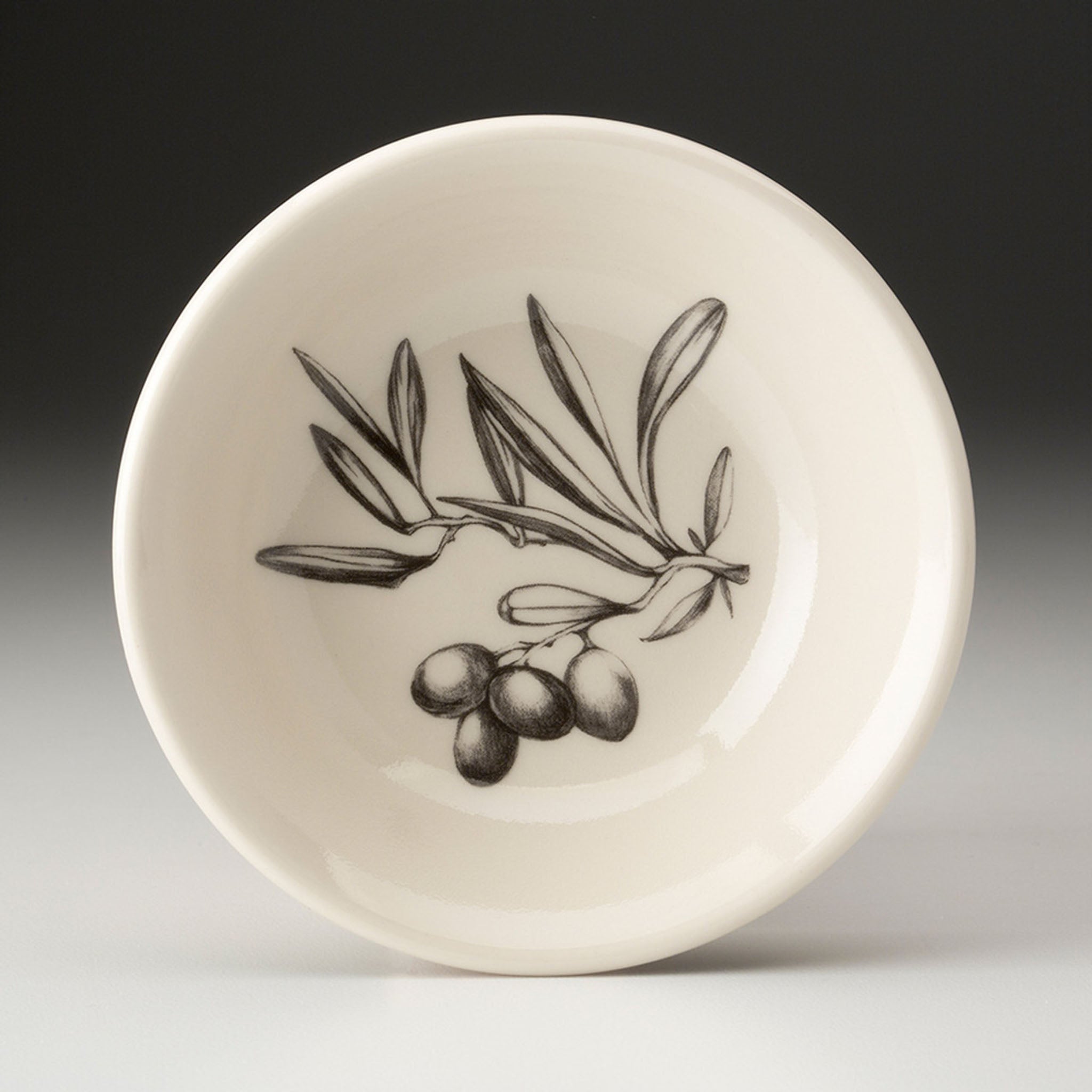 Laura Zindel Olive Bunch Sauce Bowl on a grey background at Addison West
