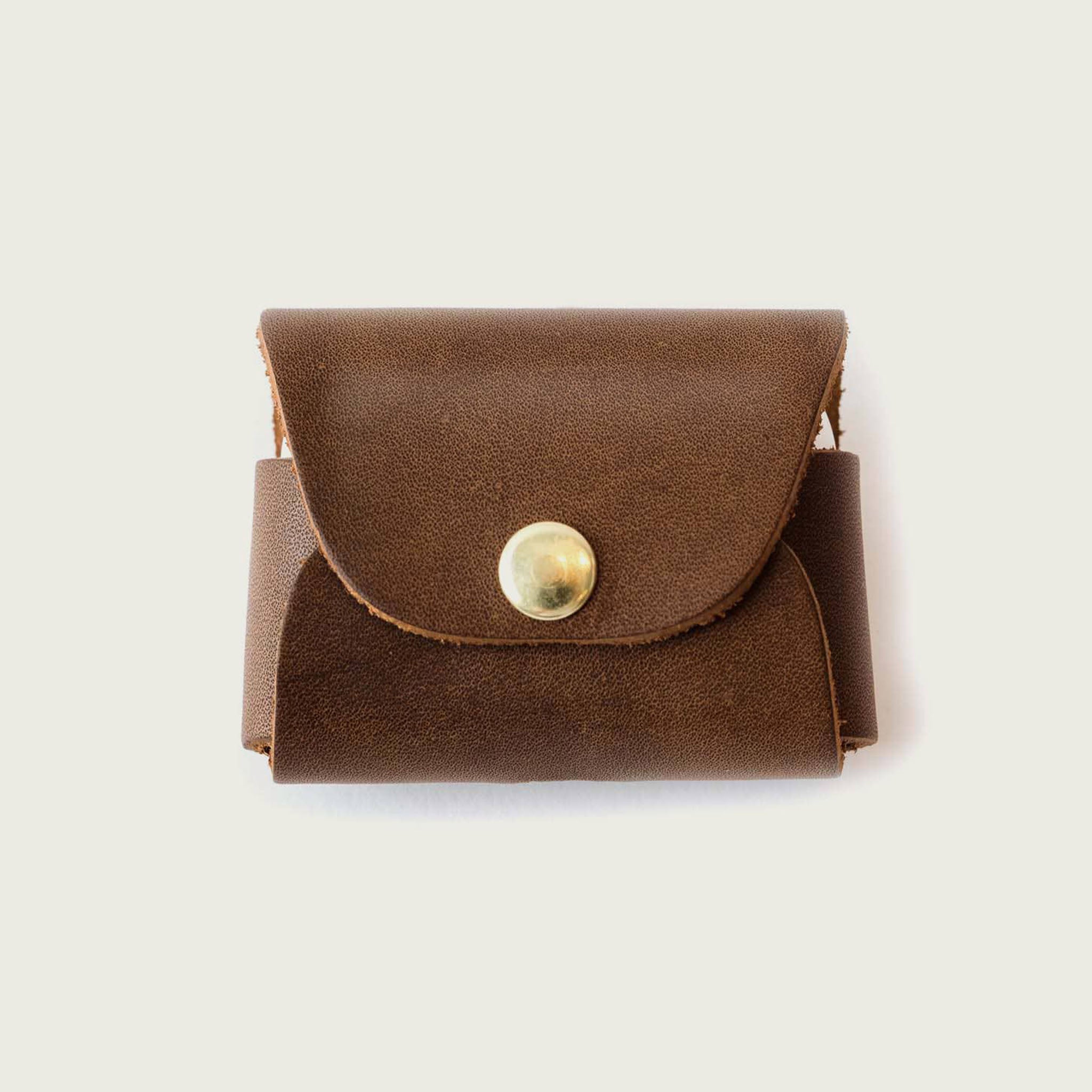 Leather AirPods Case on a white background at Addison West