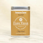 Tin of Free Verse Apothecary Lemon Laze Loose Leaf Herbal Tea Blend on a neutral background