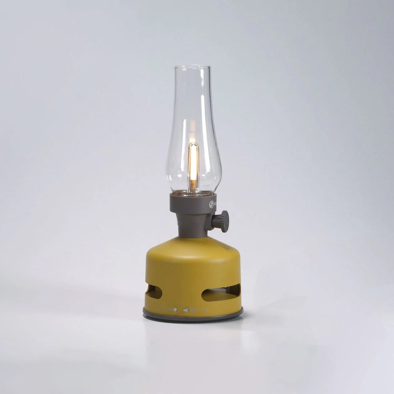 Light and Sound LED Lantern with Speaker in Mustard Yellow on a white background at Addison West