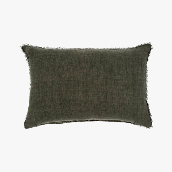 Linen lumbar pillow with frayed edges in avocado green on a white background