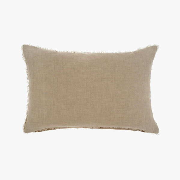 Linen lumbar pillow with frayed edges in light beige on a white background