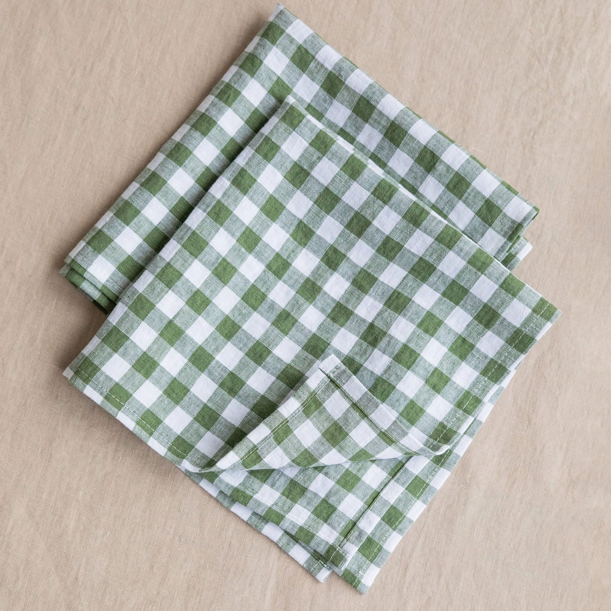 Linen Napkin Set in Forest Green Gingham on a wood surface - Addison West