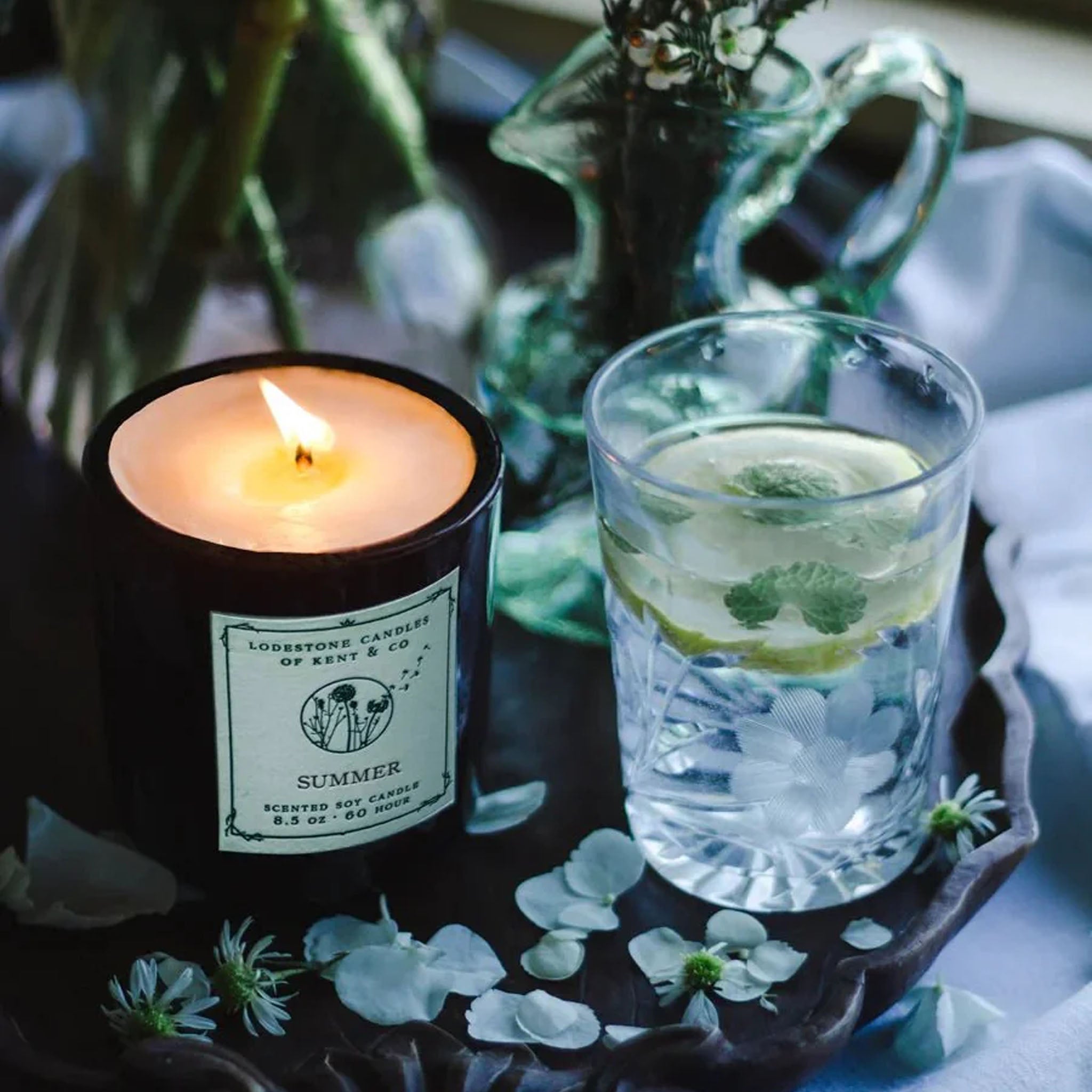 Lodestone Summer Candle on a black tray